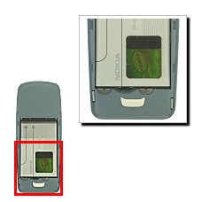 Coja por la base de la batería y presione hacia arriba para que se suelte.