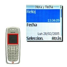 Vaya a Reloj y pulse Seleccion..