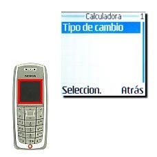 Vaya a Tipo de cambio y pulse Seleccion..