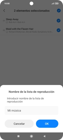 Introduce el nombre deseado de la lista de reproducción y pulsa OK. Introduce el nombre deseado de la lista de reproducción y pulsa OK.