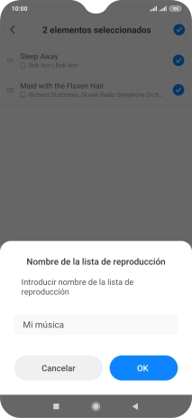 Introduce el nombre deseado de la lista de reproducción y pulsa OK. Introduce el nombre deseado de la lista de reproducción y pulsa OK.