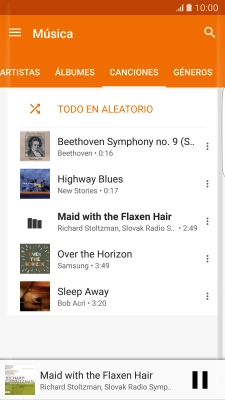 Pulsa la cubierta del álbum en la parte inferior de la pantalla. Pulsa la cubierta del álbum en la parte inferior de la pantalla.