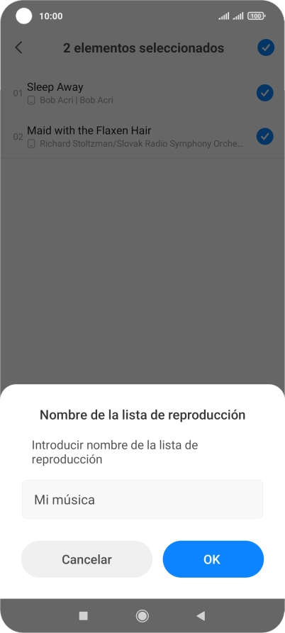 Introduce el nombre deseado de la lista de reproducción y pulsa OK.