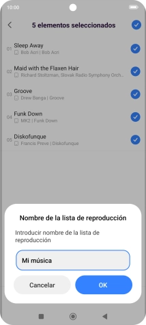 Introduce el nombre deseado de la lista de reproducción y pulsa OK. Introduce el nombre deseado de la lista de reproducción y pulsa OK.