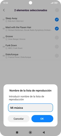 Introduce el nombre deseado de la lista de reproducción y pulsa OK. Introduce el nombre deseado de la lista de reproducción y pulsa OK.
