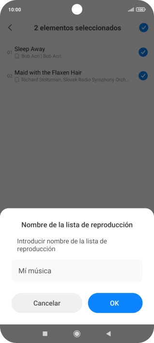 Introduce el nombre deseado de la lista de reproducción y pulsa OK. Introduce el nombre deseado de la lista de reproducción y pulsa OK.