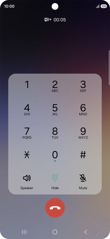 Press the end call icon.