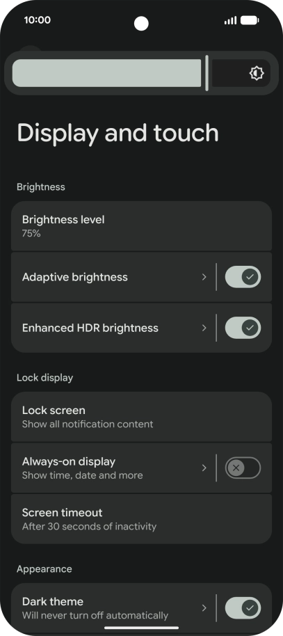 Drag the indicator right or left to set the brightness manually.
