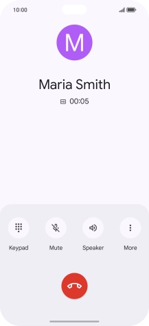 Press the end call icon.
