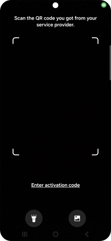 Place the QR code you've received inside the phone camera frame to scan the code. Your eSIM is transferred to your new phone over the internet.