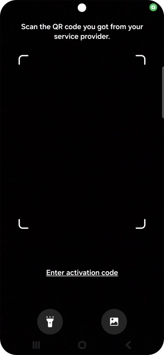 Place the QR code you've received inside the phone camera frame to scan the code. Your eSIM is transferred to your new phone over the internet.