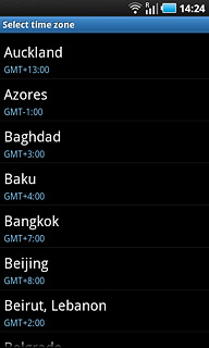 Press the required time zone.