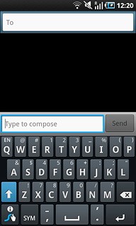 Press and hold the message field until a pop-up menu is displayed.