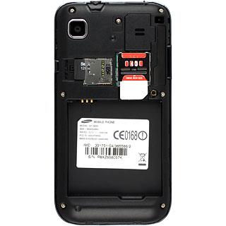 Slide the memory card into the holder and press it until it clicks into place.