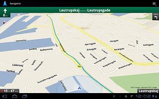 The navigation window with information about your route is displayed.The next turn and the next route detail are displayed at the top of the display.