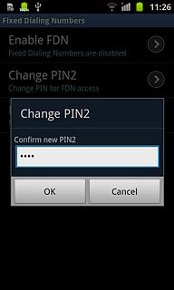 Key in the new PIN2 again and press OK.