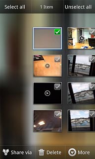 Press the required picture or the required video clip to tick it.