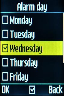 Highlight the required day and press the Navigation key.