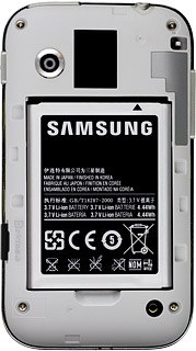 Turn the memory card as illustrated next to the memory card holder.Slide the memory card into the memory card holder until it clicks into place.