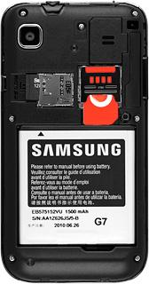 Slide the memory card into the holder and press it until it clicks into place.
