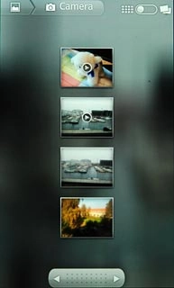 Go to the required folder.Press the required picture or the required video clip.