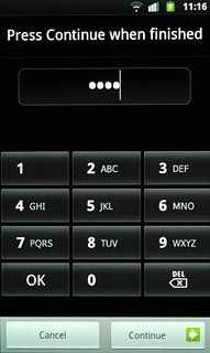 Key in the required phone lock code and press Continue.