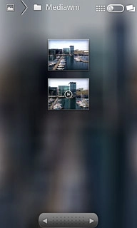 Go to the required folder.Press the required picture or the required video clip.