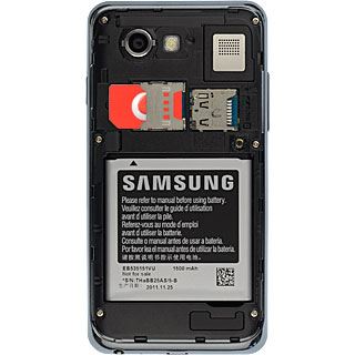 Turn the memory card as illustrated next to the memory card holder.