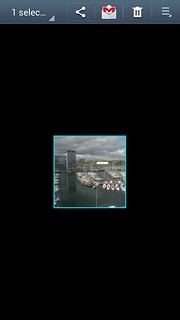 When a picture or video clip is displayed in a blue frame, it's selected.