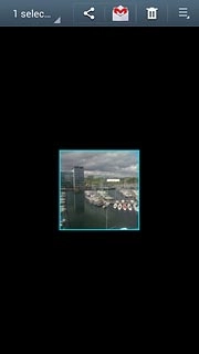 When a picture or video clip is displayed in a blue frame, it's selected.