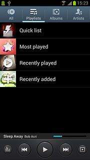 Press Playlists at the top of the display.