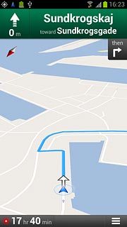 The travel time is displayed at the bottom of the display.Follow the verbal instructions or the instructions on the display to go to the selected destination.