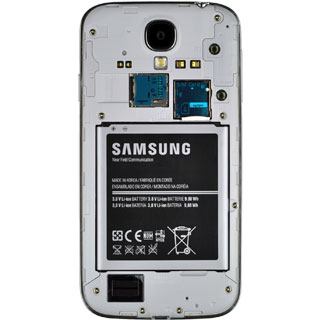 Place the battery in your phone, top first, matching the battery contacts with the phone contacts and press the battery into place.