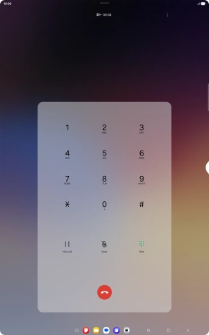 Press the end call icon.